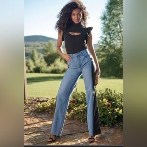 Women’s jeans with black snake skin side stripe